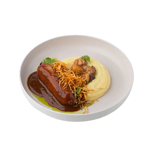 Изображение Колбаска из цыпленка с картофельным пюре и белыми грибами