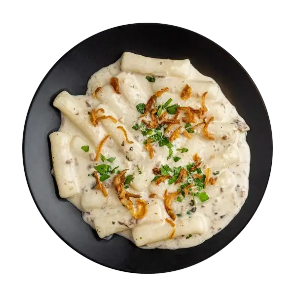 Изображение Токпокки с грибным соусом